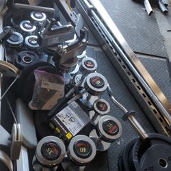 Dumbells (chrome) and swivel dumbell rack 