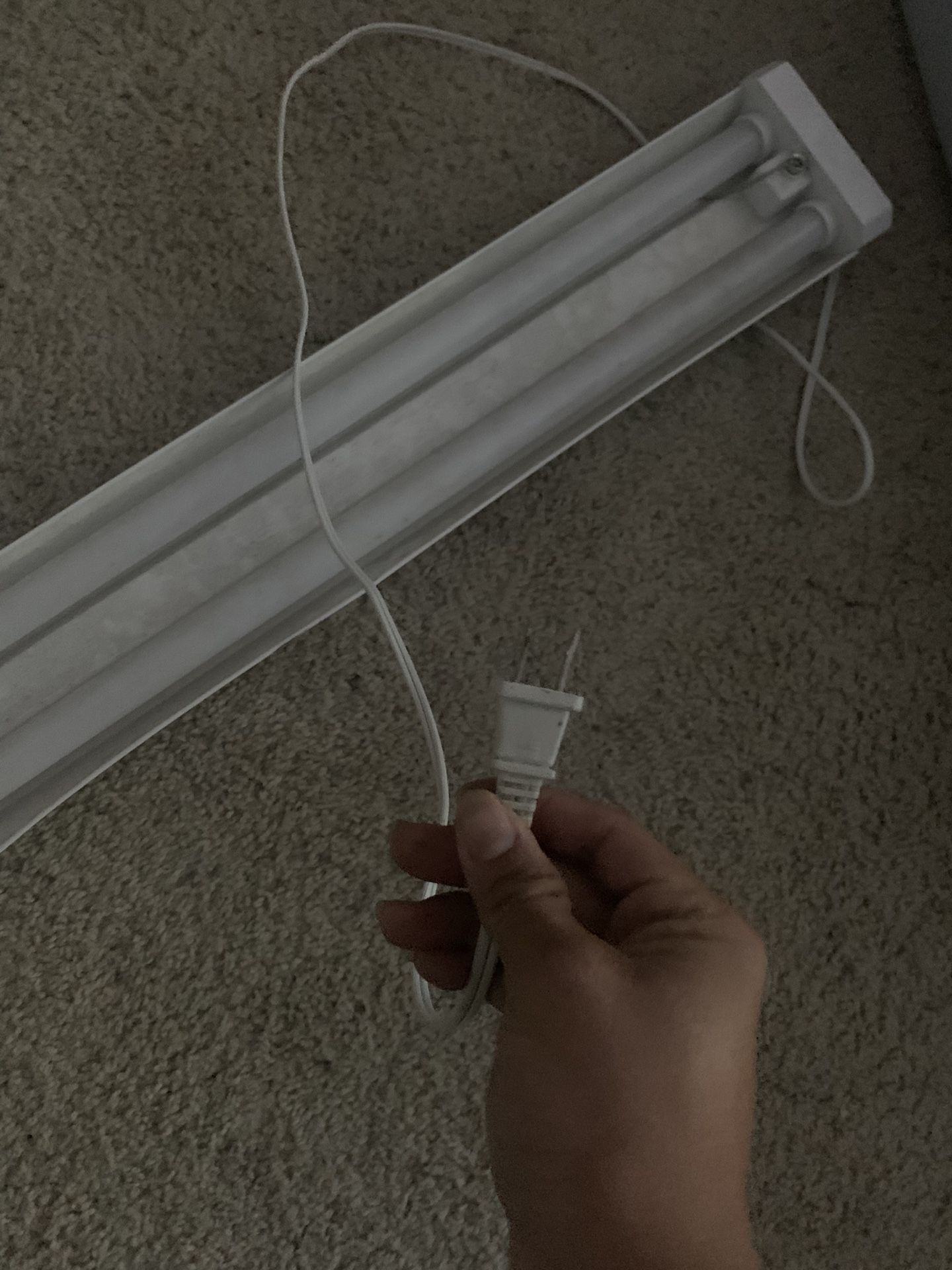 two tables and one bright tube light