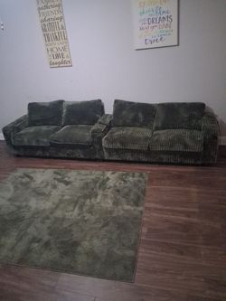 Forest Green Couch with usb ports and matching rug