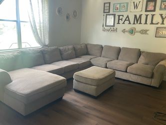 Large sectional couch with ottoman