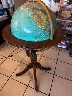 globe with antique wood stand