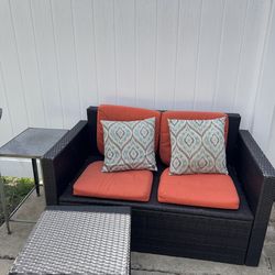 Yard furniture with 2 tables.