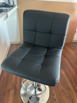 3 black barstools