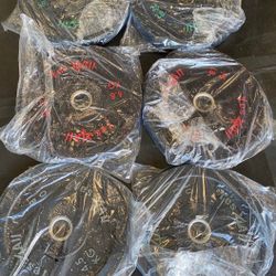 Three Pairs Of Bumper Weights, A 25 A 15 And A 10