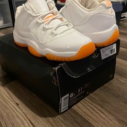 AIR JORDAN 11 RETRO LOW CITRUS SIZE 6Y/7.5 WOMEN