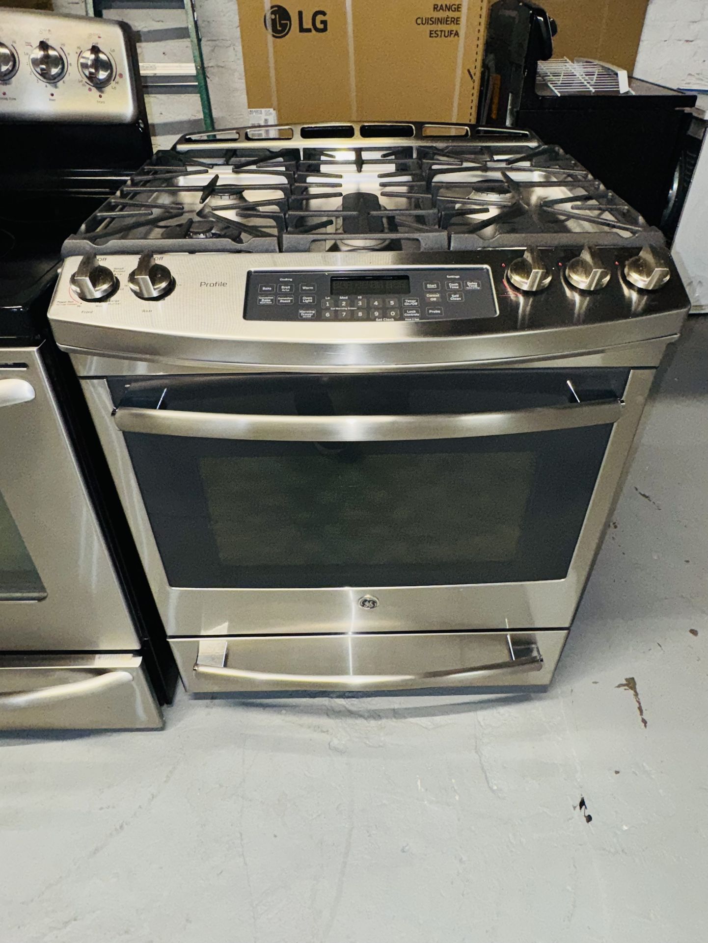 GE stainless steel gas stove, a receipt for a 60-day warranty