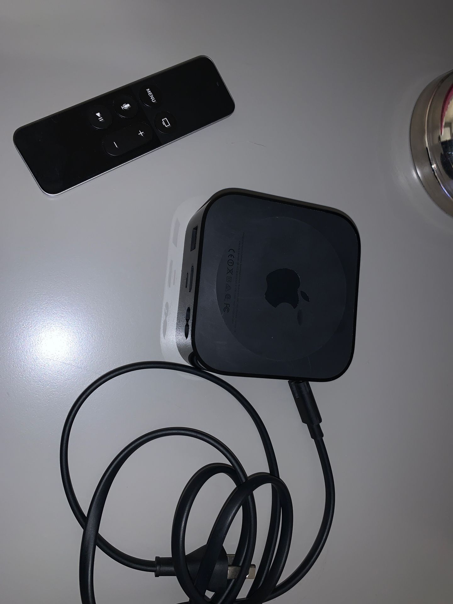 Apple TV (remote,plug,and console)