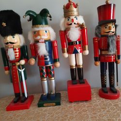 4 NUTCRACERS 15 INCHES TALL.