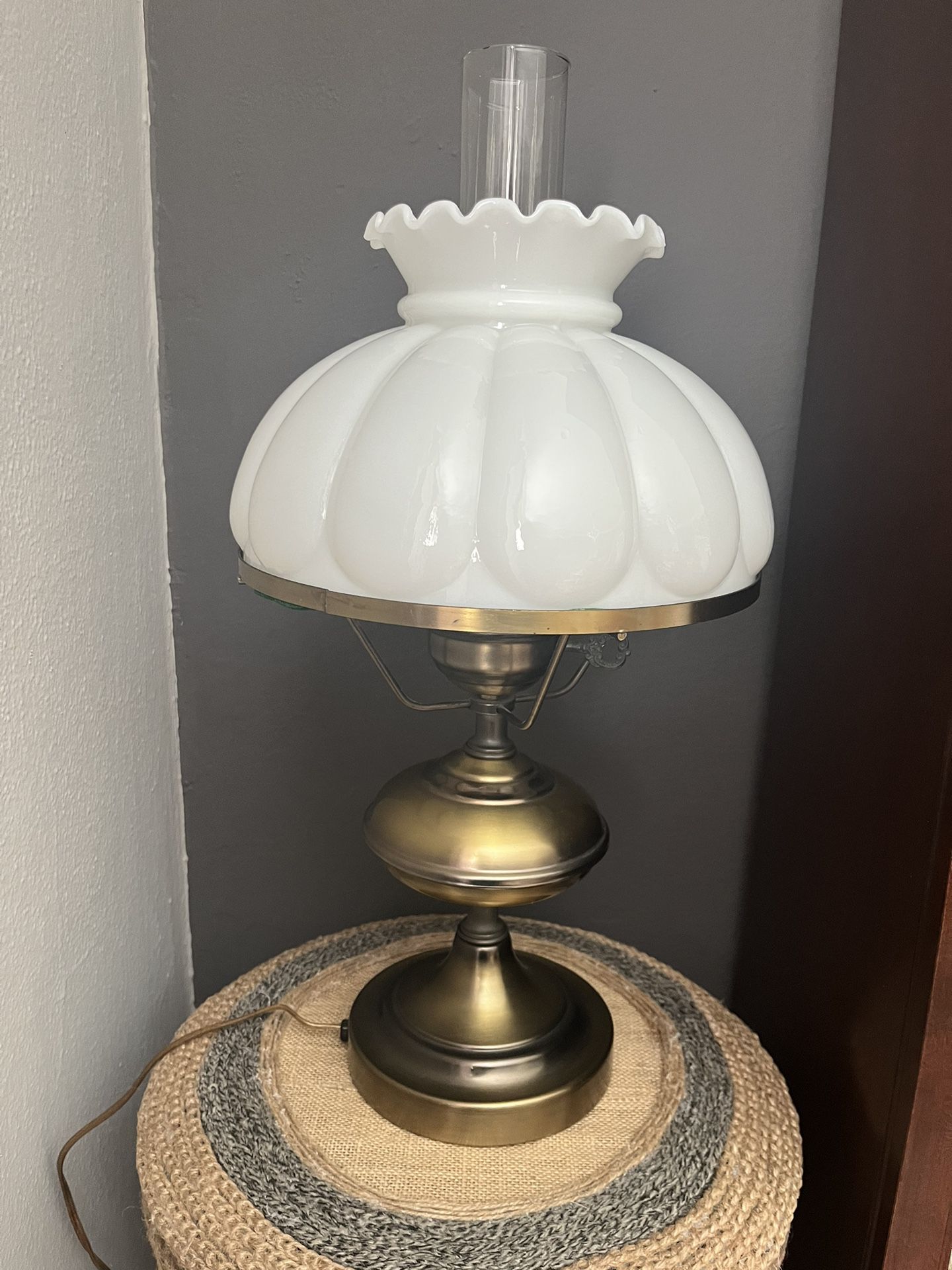 Vintage metal lamp with antique brushed brass-tone finish