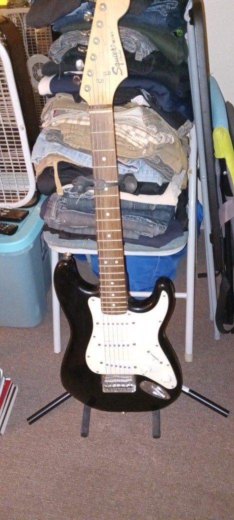 Electric Squire Mini Guitar By Fender With Stand