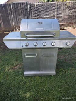 "Nexgrill 4-Burner + Side Burner + Includes 2 Propane Tanks
