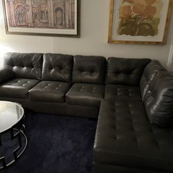 Grey Leather Sectional Sofa. 