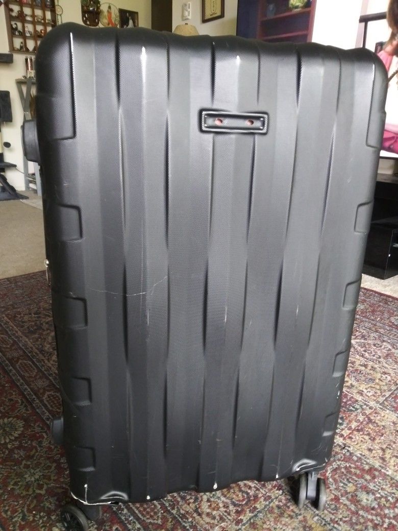 Medium Black Luggage with Wheels.