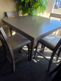 BRAND NEW GRAY SMOOTH FINISHED PUB HIGH DINING TABLE + 4 GRAY LINEN CHAIRS
