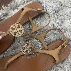 Tan tory burch sandals with gold logo