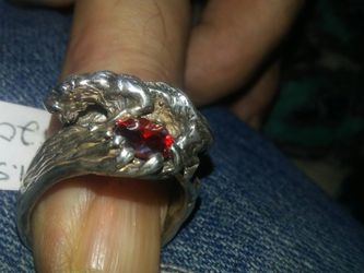 Sterling silver. Hand made.big cat on top.with a red stone. One of a kind