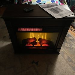 Amish Fireplace Heater One Has Book. Both Remote  Sold By The Heater