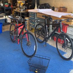 His And Hers Cannondale Touring Bikes With Front Shock Disk Brakes. His Bike Is Size Large And Hers Is Small. Comes With Errand Basket.