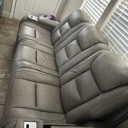 Ashley The Man-Den Leather Power Reclining Sofa with Adjustable Headrests & Wire