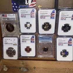 Eight individual slab coins American