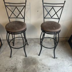 Two Bar Stools And Living Room Glass Tables