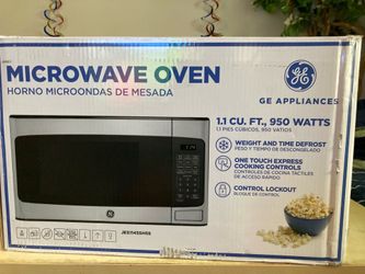 GE Microwave Oven - 1.1 Cu. Ft - 70$