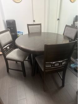 Table and 4 chairs $100