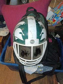 Football helmet shaped backpack