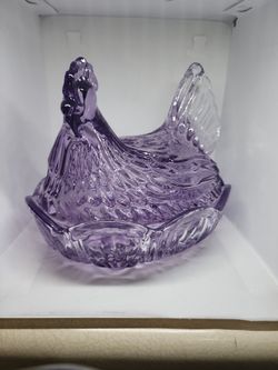 This Item appears to be a Vintage glass "Hen on a nest".