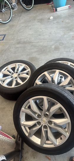 Wheels and tires off a Chevy impala
