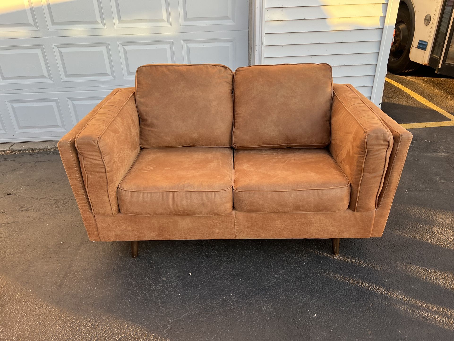 A Modern Couch And Loveseat