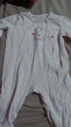 Baby clothes one of them is 9 months and the other one is 3 months