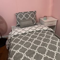 Twin bed with 2 night stands