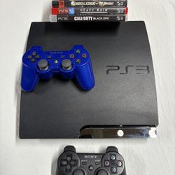 PS3 w/ Controllers & Games