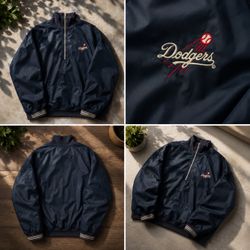 Navy blue vintage 90s Los Angeles Dodgers windbreaker jacket with embroidered logo #dodgers