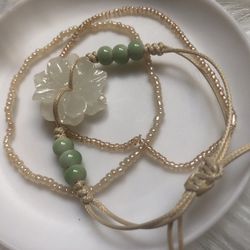 One boho floral adjustable & two bead bracelets
