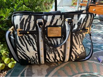 L.A.M.B. by Gwen Stefani satchel