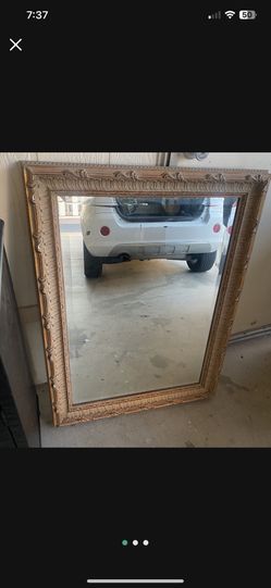 Beautiful Large Wood Carved Beveled Mirror. No Reason. Hangs Either Direction. Great Condition.
