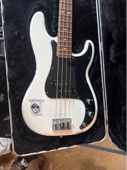Fender Player II Precision Bass — with case, strap, picks, tuner, and headphone amp.