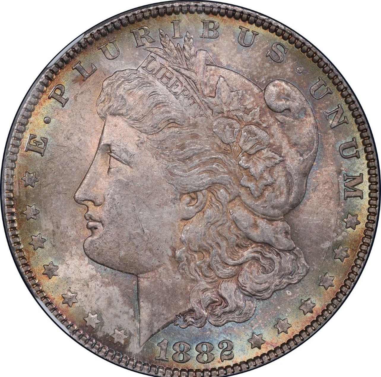 1882 MS 63 US silver Morgan, dollar with a rainbow tone on front and back