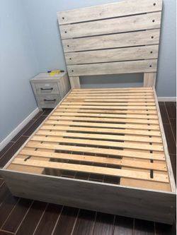 Full size bed with nightstand
