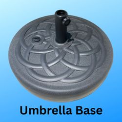 New, 22 Inch round umbrella stand that can be filled with sand or water, weighing 64 lbs.
