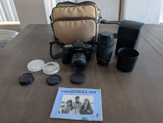 Canon EOS Elan 35mm Film Camera with 2 sigma lens