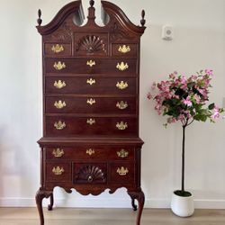 Beautiful wooden vintage dresser , material mahogany,brass Thomasville chippendale style bonnet. Top highbo 37”W x 20 “ D x 84” H ,working well all dr