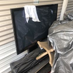 LG 40’ Maybe 45’ TV W/ Tv Stand