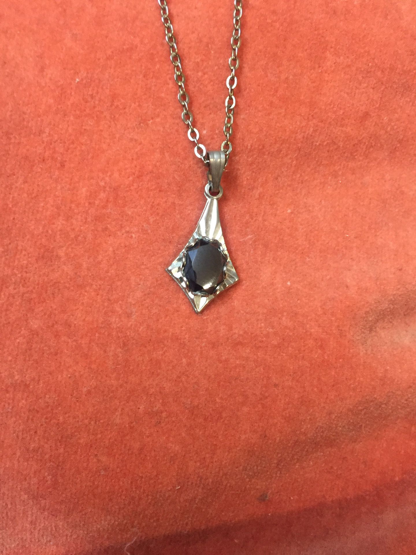 Silver a pendent with metal chain