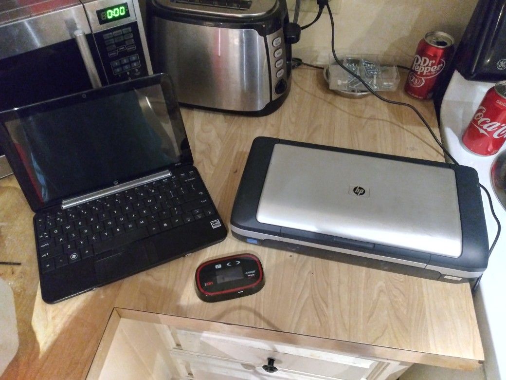 Hp mini laptop up bluetooth portable printer and jetpack