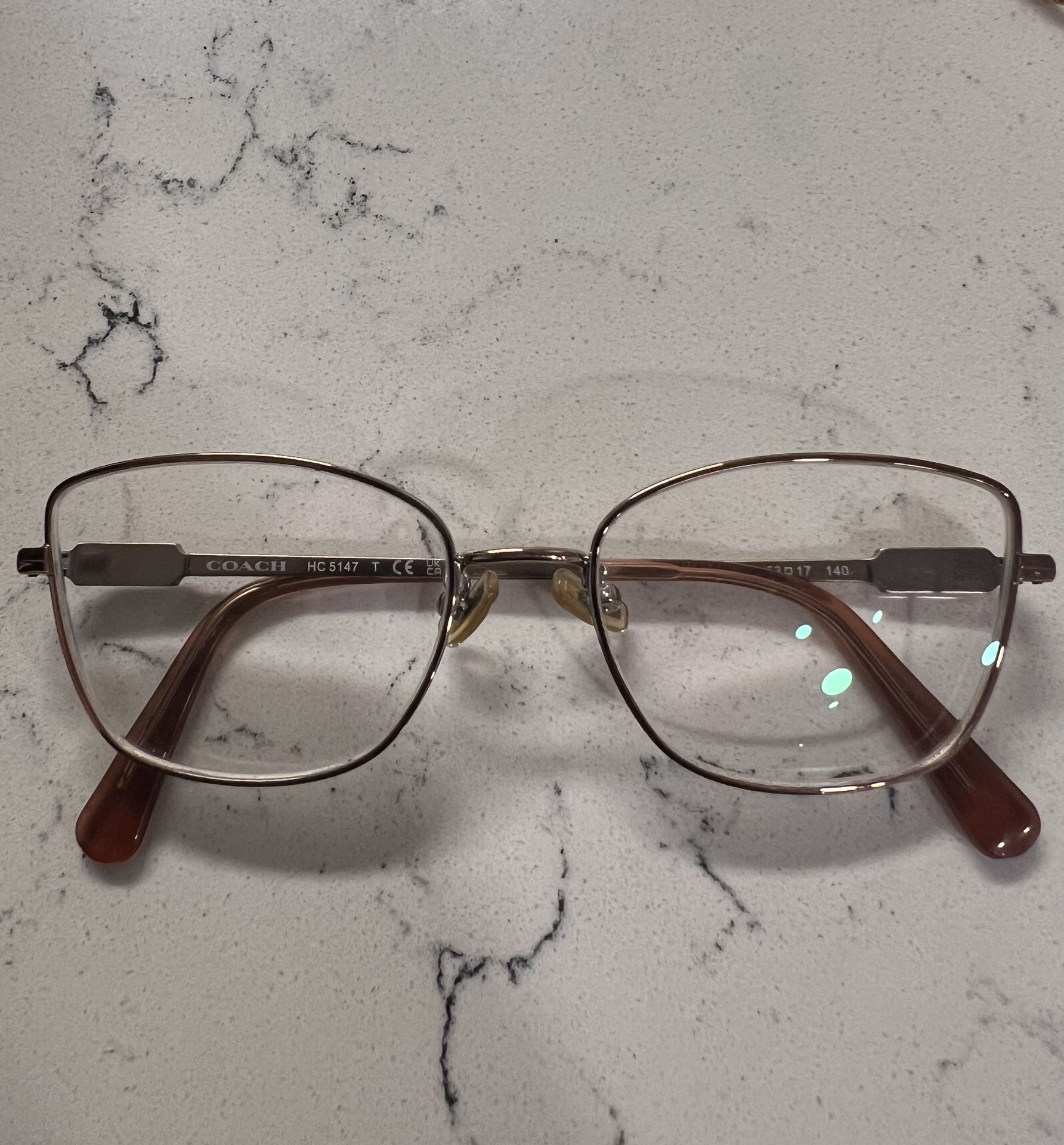 COACH: BEAUTIFUL SHINY ROSE GOLD GLASSES