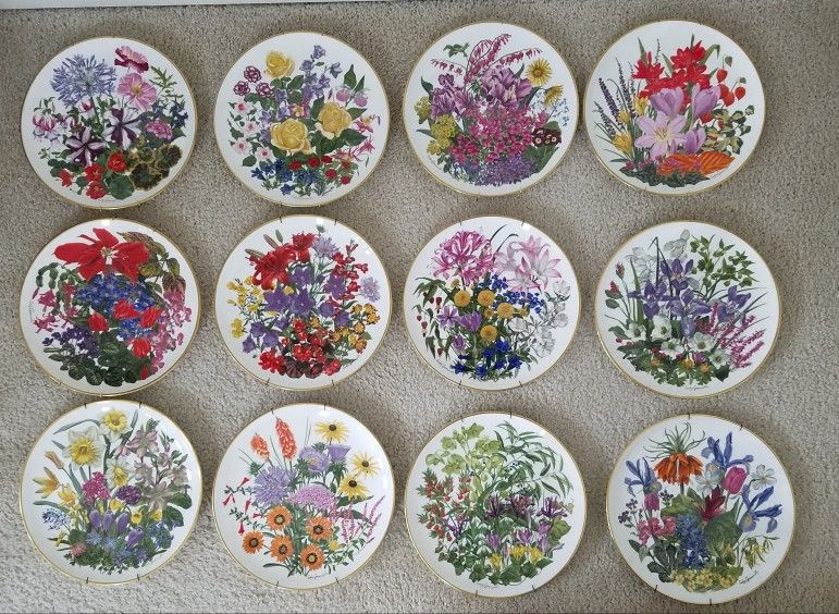 12 Dinner Plates From The Franklin Mint Flowers of the year plate collection