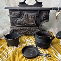 Antique cast iron miniature stove